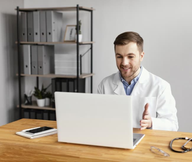 doctor working with laptop